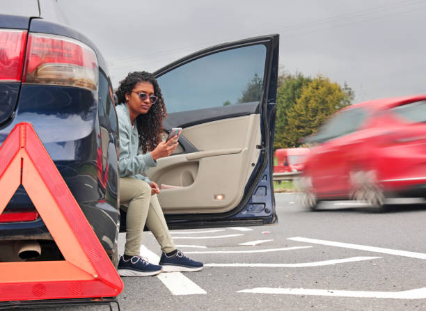 Stranded driver safely waiting for roadside assistance in Orlando