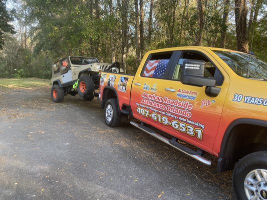 Local tow truck providing vehicle transport in Orlando Florida