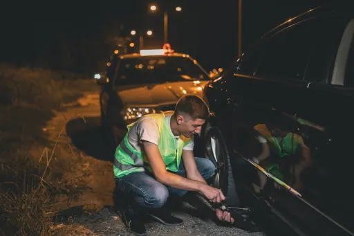 Roadside assistance helping a stranded driver with a vehicle problem